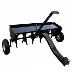Aérateur scarificateur tracté disques pour tracteur tondeuse avec dispositif d'attelage